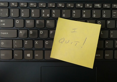 Resignation note on a keyboard